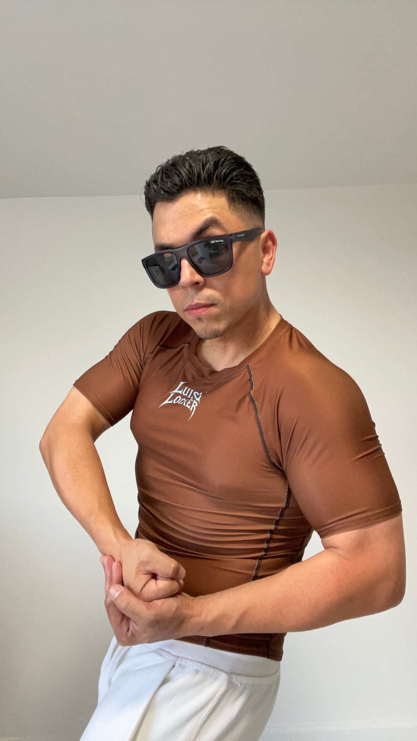 Vigilante Compression Shirt – Rich Brown w/ Icy Blue Logo (Short Sleeve) - Luis’s Locker