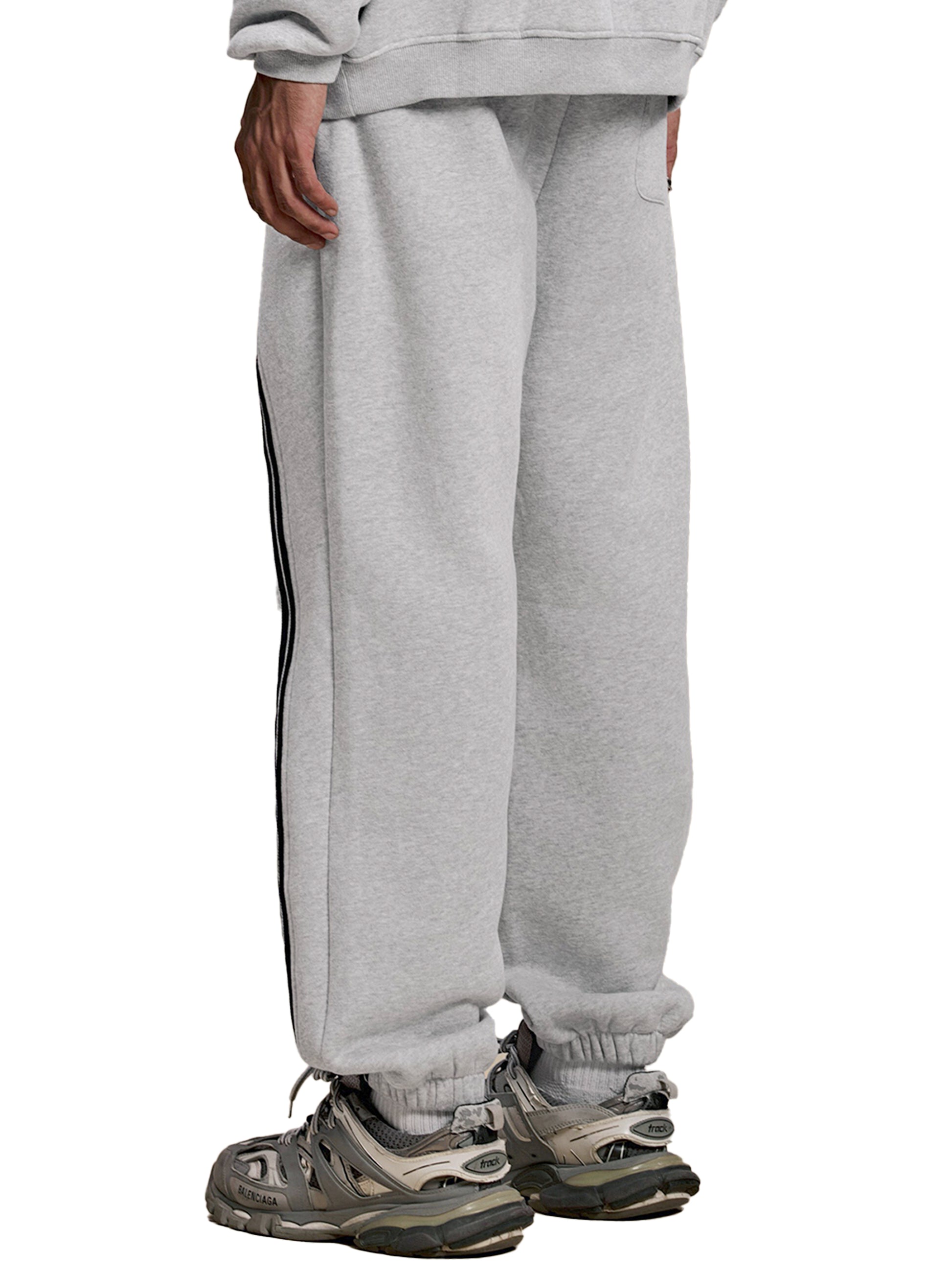 Sun Fade Contrast Tape Fleece Jogged Sweatpants - model wearing - front